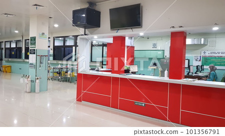 Surakarta, Indonesia, Jan 2023, Interior of recovery room in intensive care unit at Muwardi Hospital. Empty bed with medical equipment in background 101356791