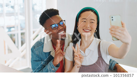 Phone selfie, peace sign and thumbs up of couple taking pictures for happy memory, social media or blog post. Love, diversity and man and woman with hand gesture taking a photo on smartphone at home. 101356857
