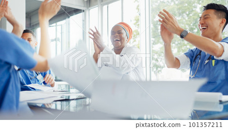 Win, success and doctors with paper in a meeting, medical breakthrough and celebration of healthcare with applause. Celebrate medicine, training smile and employees in a seminar for an achievement 101357211