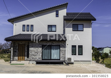 Sunny blue sky background and white house 101358023