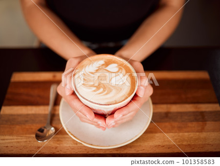 Coffee, tea and cappuccino drink in hands of a waiter working in coffee shop, cafe and restaurant. Closeup of server, employee and woman with warm or hot beverage in barista industry and hospitality Coffee, tea and cappuccino drink in hands of a waiter working in coffee shop, cafe and restaurant. Closeup of server, employee and woman with warm or hot beverage in barista industry and hospitality 101358583