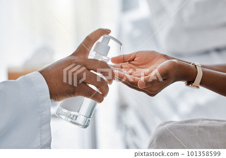Doctor giving patient hand sanitizer for protection, hygiene and bacteria disinfection in covid pandemic, protocol and virus. Healthcare safety and cleaning hands to prevent flu, corona and illness 101358599