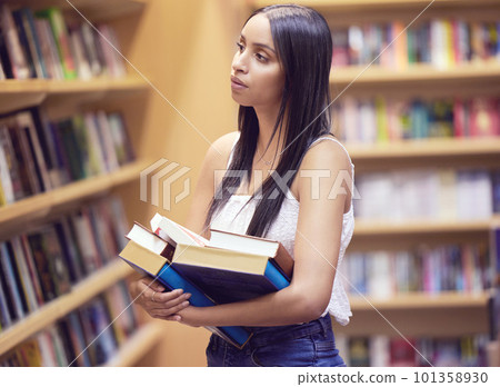 Student woman with library books university, education and thinking or learning for knowledge, scholarship research. Studying, reading lifestyle gen z with creative art print book in hands and shelf 101358930