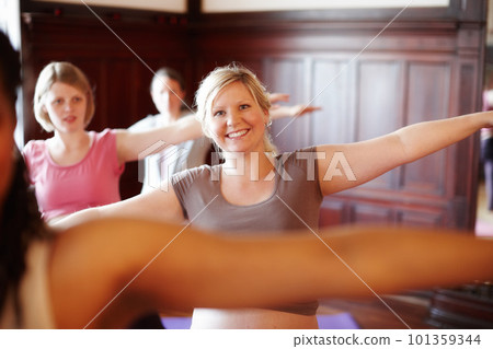 Portrait women smile and happy in yoga fitness practice in a health and wellness studio. Pilates training or exercise for body fitness and calm mind with meditation workout in class to stay healthy Portrait women smile and happy in yoga fitness practice in a health and wellness studio. Pilates training or exercise for body fitness and calm mind with meditation workout in class to stay healthy 101359344