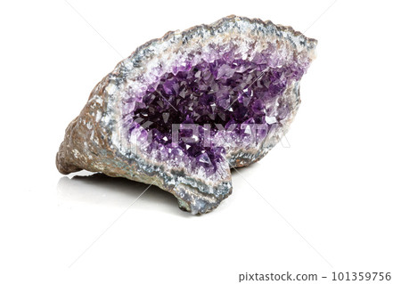 Macro Mineral Stone Amethysts in the rock on a white background Macro Mineral Stone Amethysts in the rock on a white background 101359756