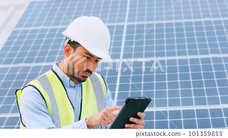 Solar, electricity and construction being done by an engineer while using a tablet for research or planning. Portrait of one young engineer browsing on technology Solar, electricity and construction being done by an engineer while using a tablet for research or planning. Portrait of one young engineer browsing on technology 101359853