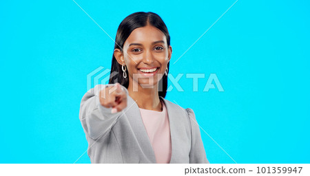 Portrait, pointing and you with a woman on a blue background in studio for option, selection or choice. Smile, happy and we are hiring with a young female employee in business making a decision Portrait, pointing and you with a woman on a blue background in studio for option, selection or choice. Smile, happy and we are hiring with a young female employee in business making a decision 101359947