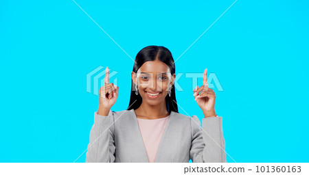 Face, employee and Indian woman with motivation, direction and happiness against a blue studio background. Portrait, female entrepreneur or lady with decision, inspiration or choice with joy or smile Face, employee and Indian woman with motivation, direction and happiness against a blue studio background. Portrait, female entrepreneur or lady with decision, inspiration or choice with joy or smile 101360163