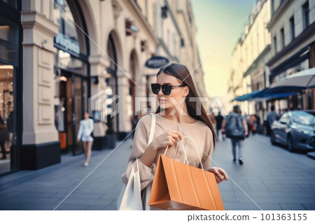 Fashionable woman enjoying shopping Fashionable woman enjoying shopping 101363155