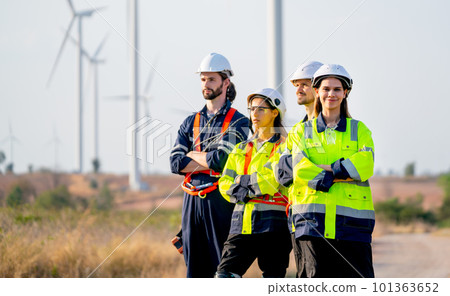 Group of engineer or technician workers stand in a row with arm-crossed and look to right side Group of engineer or technician workers stand in a row with arm-crossed and look to right side 101363652