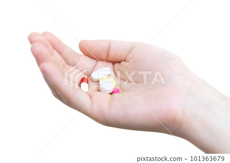 holding some pills in hand holding some pills in hand 101363679