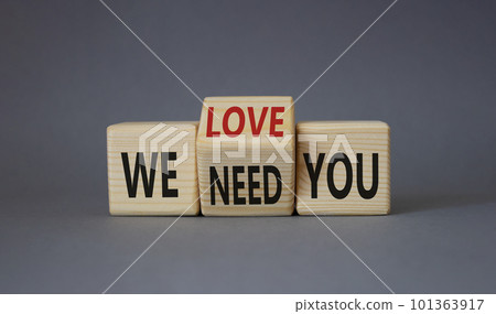 We love and need You symbol. Turned wooden cubes with words We need you and We love you. Beautiful grey background. Business and We love and need You concept. Copy space 101363917