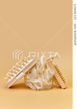 Bathroom accessories on beige background. Beauty and wellness concept Bathroom accessories on beige background. Beauty and wellness concept 101364871