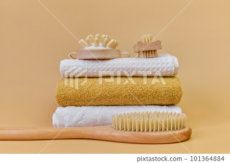 Natural massage brushes and towels for spa massage 101364884