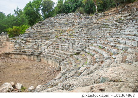 Stone amphitheater in the ancient city Phaselis. Turkey, Antalya Stone amphitheater in the ancient city Phaselis. Turkey, Antalya 101364968