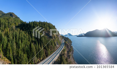 Aerial View of Sea to Sky Highway in Howe Sound. Sunset Sky. 101365584