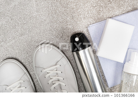 White leather shoe cleaning kit - water-repellent spray, foam, rag and sponge, copy space, place for text White leather shoe cleaning kit - water-repellent spray, foam, rag and sponge, copy space, place for text 101366166