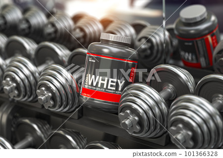 Whey protein powder in a row of dumbbells in a gym. Sports bodybuilding supplements and nutrition. Whey protein powder in a row of dumbbells in a gym. Sports bodybuilding supplements and nutrition. 101366328
