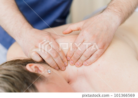 Young fat woman getting massage treatment in day spa cabinet. Young fat woman getting massage treatment in day spa cabinet. 101366569