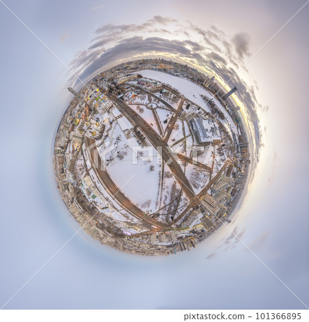 Aerial winter city view with crossroads and roads, houses, buildings, parks and bridges. Copter shot. Little planet sphere mode. 101366895