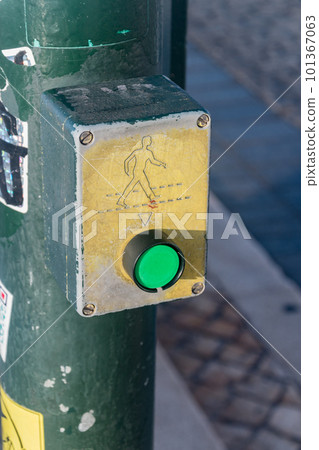 Button for pedestrians before a pedestrian crossing. 101367063