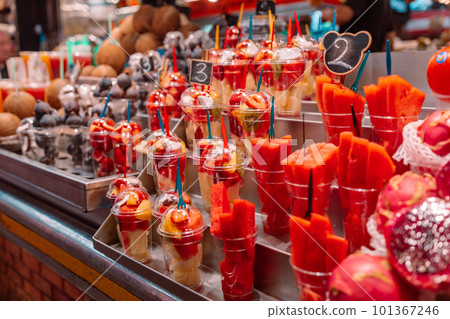 Assortment of fresh cut fruit in plastic containers in market grocery display case, Barcelona, Spain Assortment of fresh cut fruit in plastic containers in market grocery display case, Barcelona, Spain 101367246