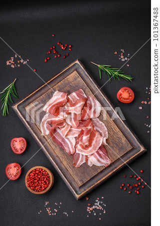 Delicious fresh pancetta with salt and spices cut into thin slices 101367488