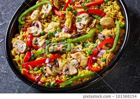 chicken mushroom paella with pepper, green peas chicken mushroom paella with pepper, green peas 101368154
