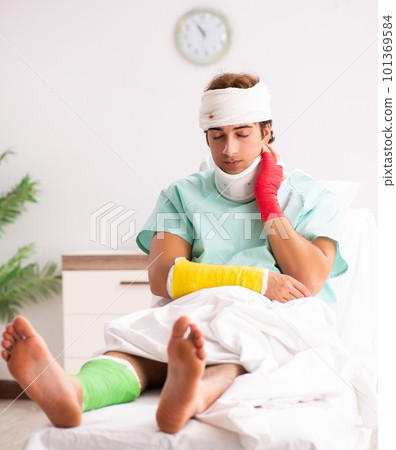 Young injured man staying in the hospital 101369584