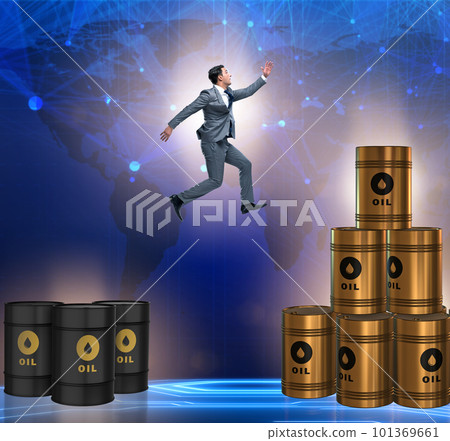 Businessman jumping from stack of oil barrels Businessman jumping from stack of oil barrels 101369661