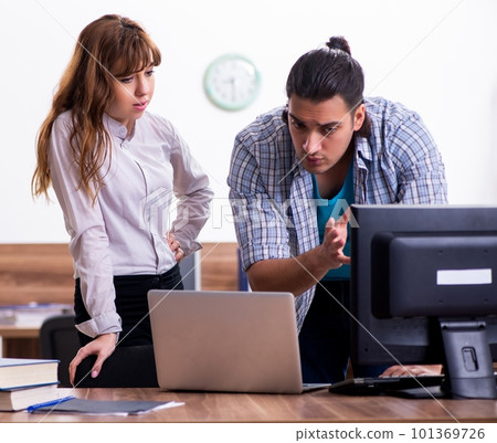 Young male it specialist in the office Young male it specialist in the office 101369726