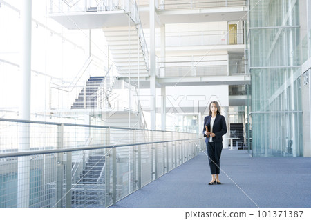 Women's portrait in suit 101371387