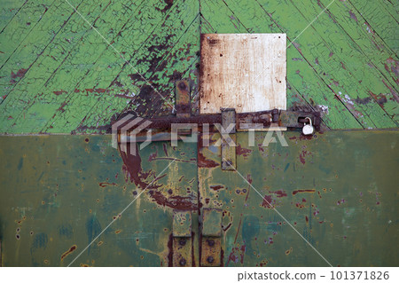 Door of the prison barricaded with padlock high security metal lock 101371826