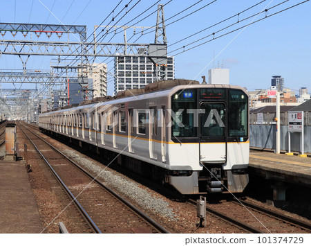 A train running near Imazato Station on the Kintetsu Nara Line 101374729