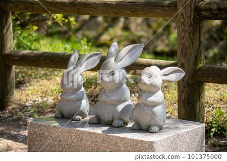 A stone statue of a rabbit A stone statue of a rabbit 101375000