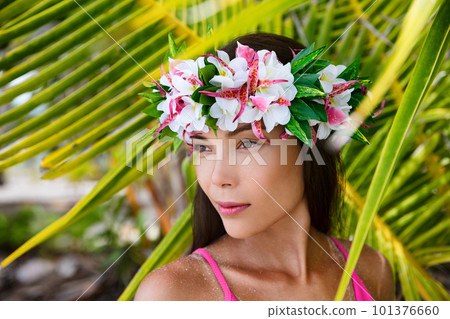 Tahiti beauty woman wearing flower head wreath traditional Tahitian cultural accessory. Bora Bora, French Polynesia. Beautiful Asian multiracial girl. 101376660