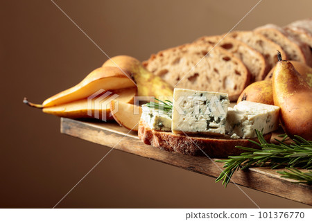 Sandwich with blue cheese, pears, and rosemary. Sandwich with blue cheese, pears, and rosemary. 101376770