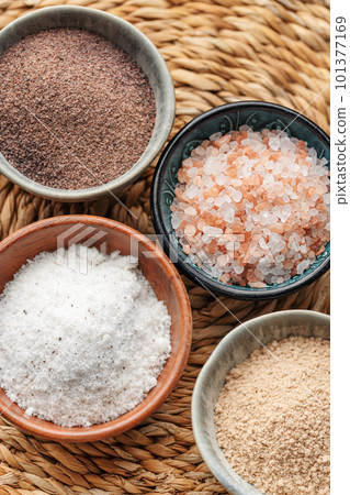 Bowls with assorted speciality salt 101377169