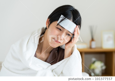 Young woman suffering from fever Young woman suffering from fever 101377557