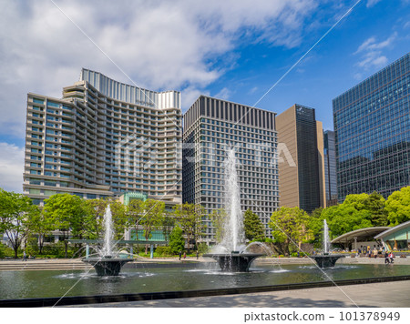 Urban landscape in early summer Wadakura Fountain Park surrounded by fresh greenery and buildings in Marunouchi Urban landscape in early summer Wadakura Fountain Park surrounded by fresh greenery and buildings in Marunouchi 101378949