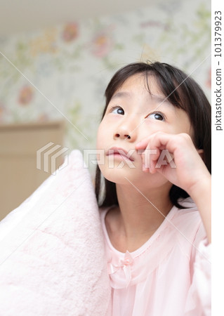 elementary school girl sleeping in bed 101379923