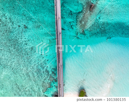 Ikema Island and Ikema Bridge shot from above Miyakojima Ikema Bridge with a drone 101380135