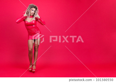 Drag queen person dancing sensually looking at the camera 101380550