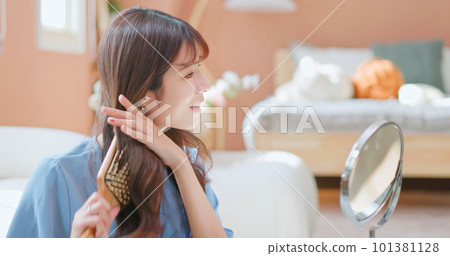 asian girl combing good hair 101381128