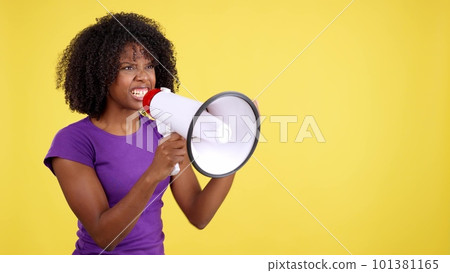 African woman yelling while using a mefaphone 101381165