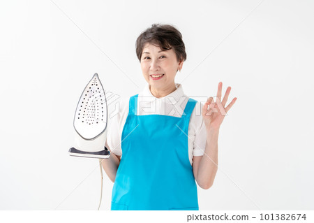 Woman in apron Iron OK Woman in apron Iron OK 101382674
