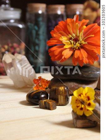Flowers and Incense Cone With Palo Santo Sticks on Meditation Table 101383605