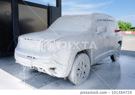 Car in foam at a car wash. Car wash with soap, car wash Car in foam at a car wash. Car wash with soap, car wash 101384729