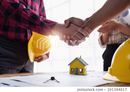 Foreman or Civil engineer handshake making modern construction. industry professional team and engineer concept 101384817