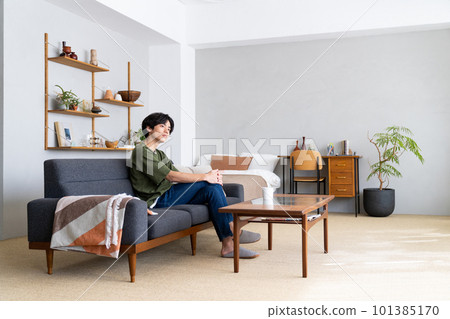 A young woman relaxing at home A young woman relaxing at home 101385170